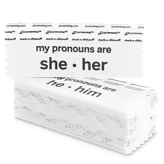 Badge ribbons featuring various pronoun options to be selected and worn by event attendees 